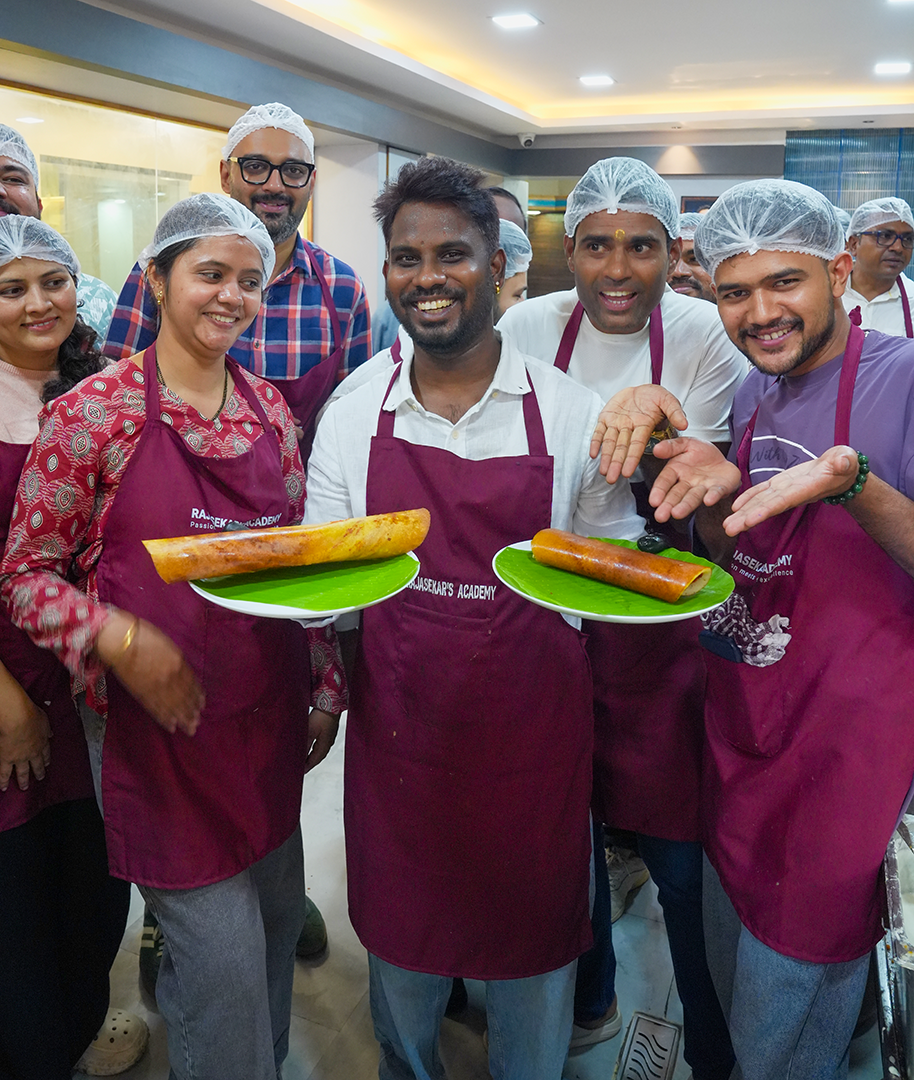 Freshly prepared dosas served on banana leaves at the academy